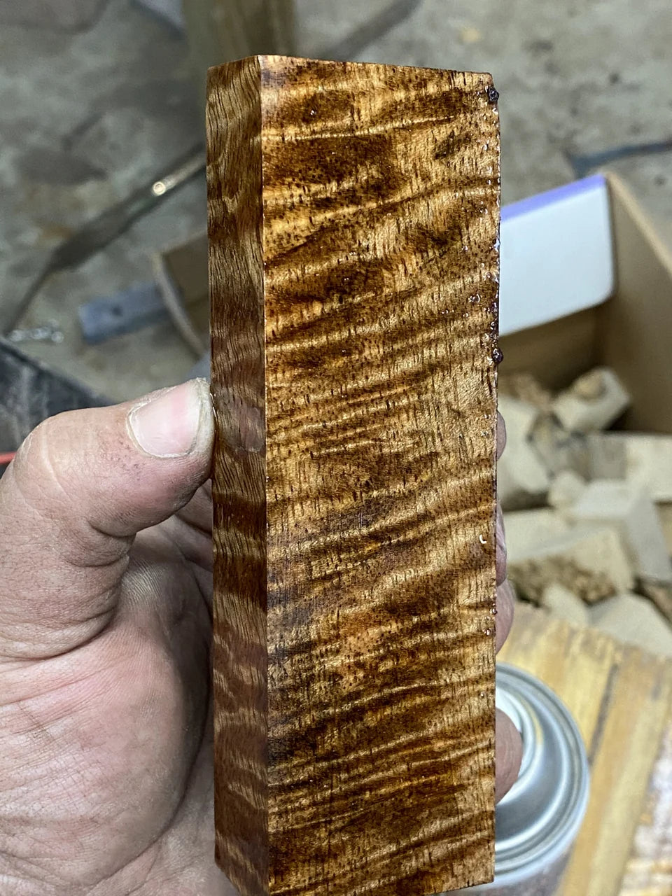 Golden figuring through a solid handle block.