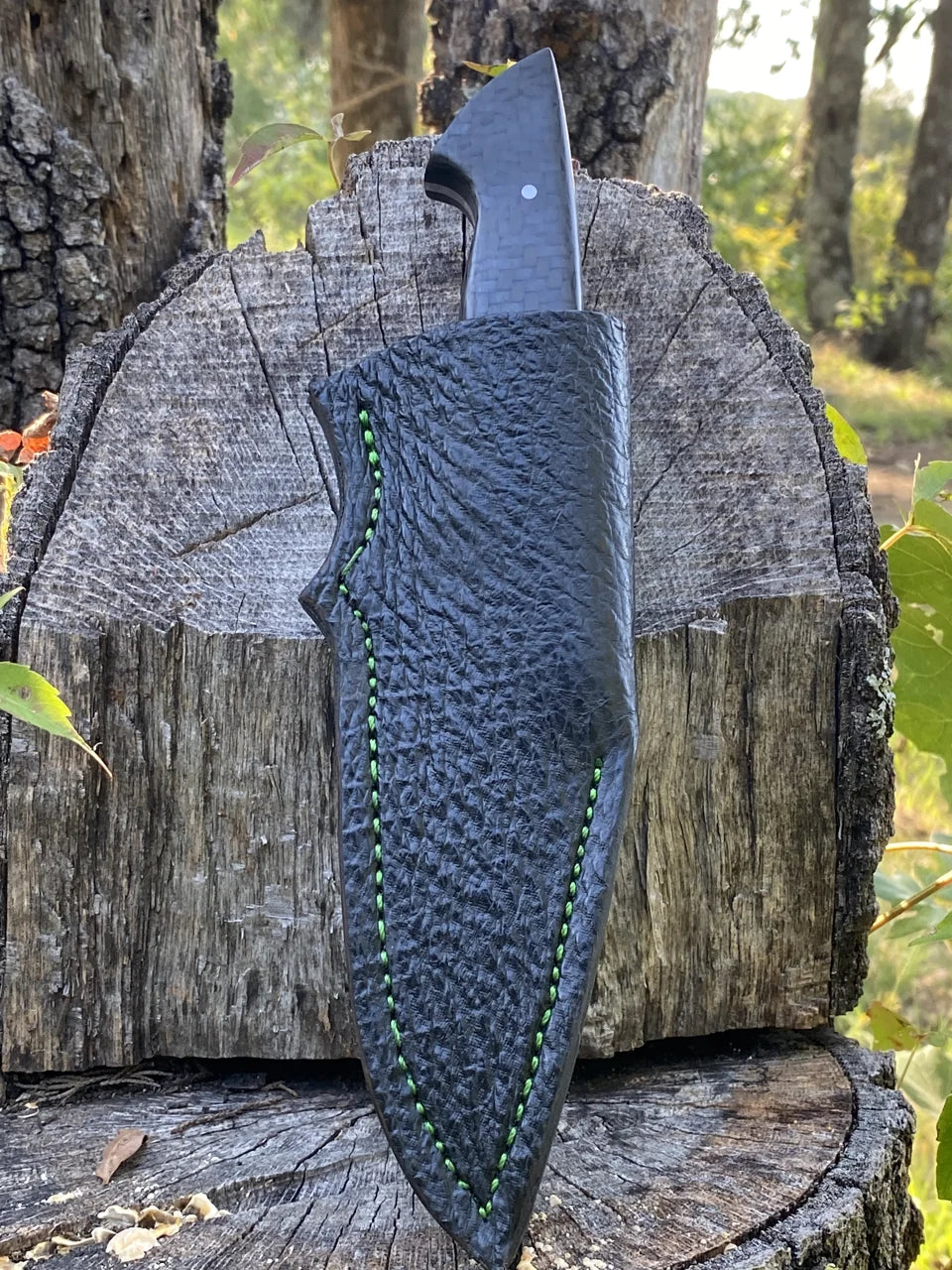 A dark fitted sheath from the work archive.